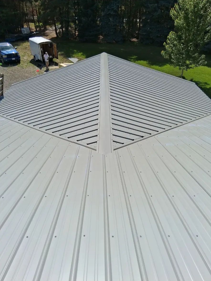 Standing seam hip roof — Roofing project by KD's Custom Exteriors