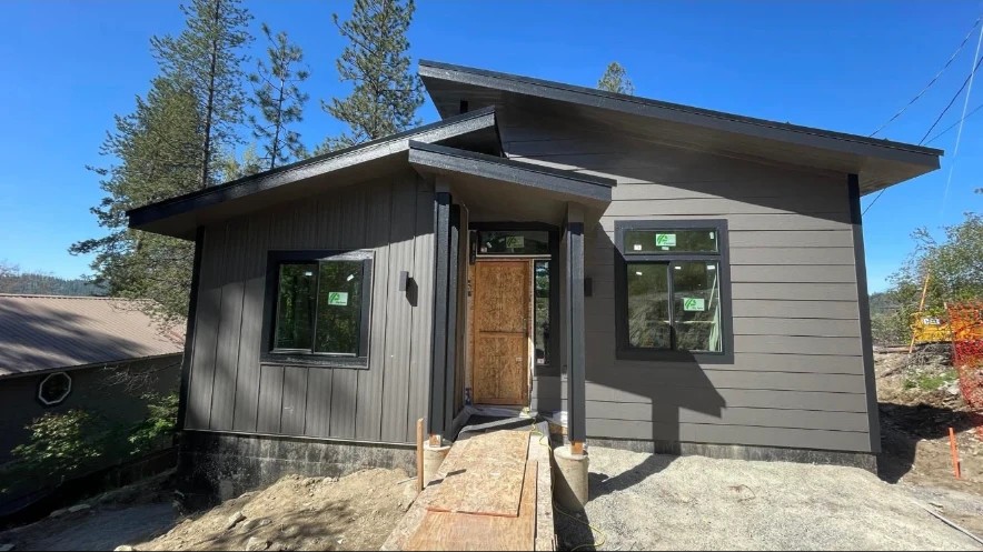 Dark modern entry elevation — Modern Builds project by KD's Custom Exteriors
