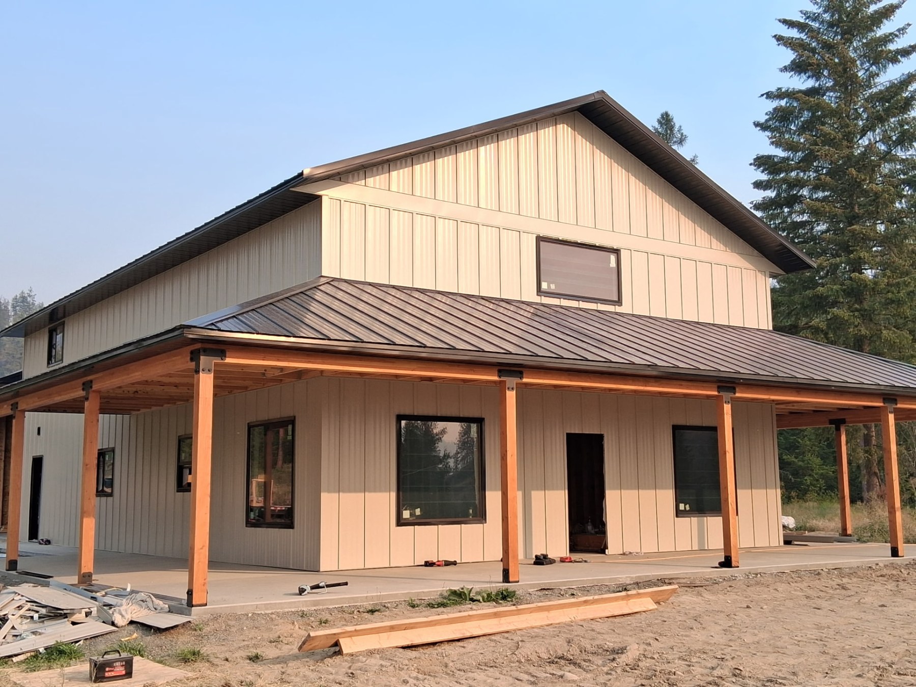 Metal barn home with wrap porch — Shops & Outbuildings project by KD's Custom Exteriors